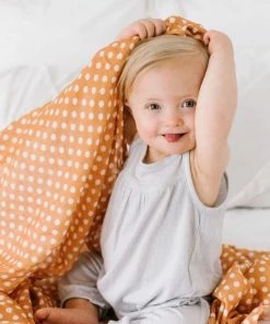 Mini Wander Polka Dot Amber Muslin Swaddle Swaddles + Blankets